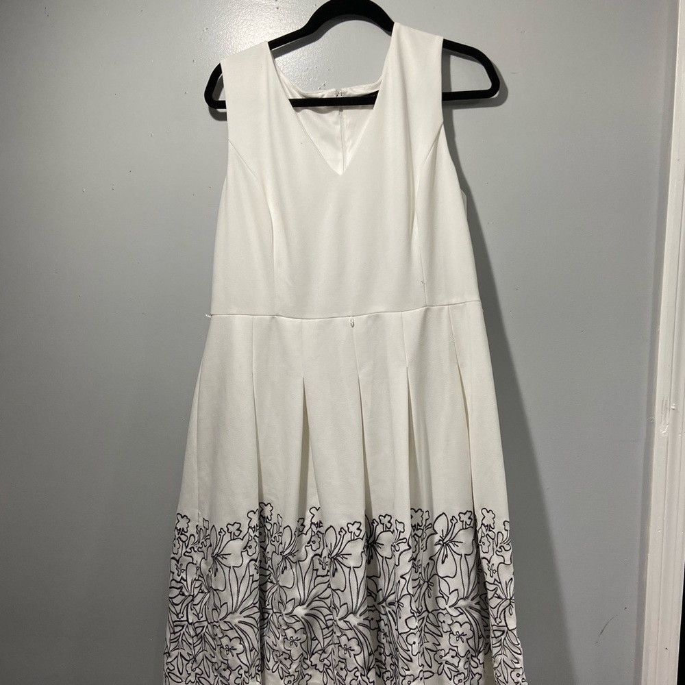 White dress with black embroidery